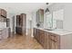 Modern kitchen with wood cabinets and white countertops at 10088 Paradise Blvd, Treasure Island, FL 33706