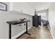 Laundry room with cabinets and a standing desk at 10088 Paradise Blvd, Treasure Island, FL 33706