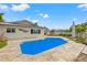 Inviting pool with stone deck at 10088 Paradise Blvd, Treasure Island, FL 33706