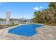 Inviting pool with large patio and canal view at 10088 Paradise Blvd, Treasure Island, FL 33706