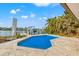 Private pool and patio overlooking the water at 10088 Paradise Blvd, Treasure Island, FL 33706