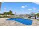 Inviting pool and patio area, perfect for outdoor entertaining at 10088 Paradise Blvd, Treasure Island, FL 33706