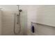 Clean shower with modern fixtures and tiled walls at 10088 Paradise Blvd, Treasure Island, FL 33706