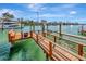 Private dock with walkway offers direct water access at 43 Leeward Is, Clearwater Beach, FL 33767