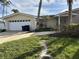 Single-Gathering home with attached garage at 43 Leeward Is, Clearwater Beach, FL 33767