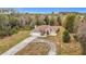 Aerial view of a single Gathering home with a large front yard at 4367 Burns Rd, Brooksville, FL 34602