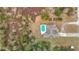 Home with pool, situated on a large lot with trees at 4367 Burns Rd, Brooksville, FL 34602