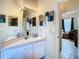 Double vanity bathroom with updated fixtures at 4367 Burns Rd, Brooksville, FL 34602