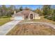 One-story home with attached garage and circular driveway at 4367 Burns Rd, Brooksville, FL 34602