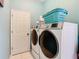 Laundry room with washer and dryer, and storage at 4367 Burns Rd, Brooksville, FL 34602