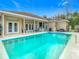 Inviting rectangular pool with patio and fenced backyard at 4367 Burns Rd, Brooksville, FL 34602