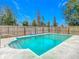 Clean, rectangular pool with surrounding fenced yard at 4367 Burns Rd, Brooksville, FL 34602