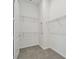 Spacious walk-in closet with wire shelving provides ample storage at 9433 Barnacle Ln, Parrish, FL 34219