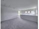 Bright bonus room featuring carpet and multiple windows at 3033 54Th N Ave, St Petersburg, FL 33714