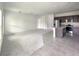 Open concept kitchen with stainless steel appliances and dark cabinets at 3033 54Th N Ave, St Petersburg, FL 33714