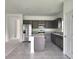Modern kitchen with stainless steel appliances and granite countertops at 3033 54Th N Ave, St Petersburg, FL 33714