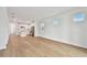 Bright living room with hardwood floors and sliding glass doors at 9461 Shorebird Ct, Parrish, FL 34219