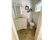 Simple bathroom with toilet and vanity at 37308 Kinkaid Dr, Zephyrhills, FL 33541