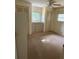 Second bedroom with built-in drawers and ample closet space at 37308 Kinkaid Dr, Zephyrhills, FL 33541