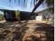 View of the backyard with patio and screened enclosure at 4723 114Th N St, St Petersburg, FL 33708