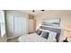 Comfortable bedroom with a double bed and ample closet space at 31422 Briars Ml, San Antonio, FL 33576