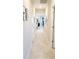 Bright hallway with tile flooring and access to other rooms at 31422 Briars Ml, San Antonio, FL 33576