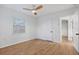 Charming bedroom with ceiling fan and wood-look flooring at 3170 6Th S Ave, St Petersburg, FL 33712