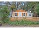 Charming renovated cottage with wood accents and picket fence at 3170 6Th S Ave, St Petersburg, FL 33712