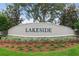 Lakeside community entrance sign with landscaping at 13640 Eastfork Ln, Hudson, FL 34669