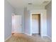 Simple bedroom with neutral walls, carpeting, and a sizable closet at 16623 Ashton Green Dr, Lutz, FL 33558