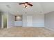 Large main bedroom with ceiling fan and carpet flooring at 16623 Ashton Green Dr, Lutz, FL 33558