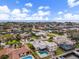 An aerial shot of a waterfront property with a pool and canal access at 2000 Kansas Ne Ave, St Petersburg, FL 33703