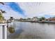 Scenic waterfront view of a calm canal and neighboring properties at 2000 Kansas Ne Ave, St Petersburg, FL 33703