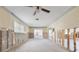 Blurry image of a living room under construction, exposed walls and flooring at 2000 Kansas Ne Ave, St Petersburg, FL 33703