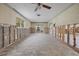 Living room with exposed walls and flooring during renovations; shows a view to the outside at 2000 Kansas Ne Ave, St Petersburg, FL 33703