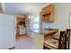 Kitchen with granite countertop and wood cabinets at 8495 109Th St, Seminole, FL 33772