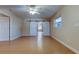 Bright living room featuring tile floors and barn doors at 8495 109Th St, Seminole, FL 33772