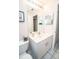 Clean bathroom with single sink vanity and shower at 905 Oxford Park Dr # A, Sun City Center, FL 33573