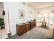 Cozy dining area with wood table and chairs, near kitchen and bedroom at 905 Oxford Park Dr # A, Sun City Center, FL 33573