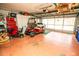 Spacious garage with golf cart and ample storage at 905 Oxford Park Dr # A, Sun City Center, FL 33573