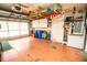 Garage with overhead storage, ample space for car and additional items at 905 Oxford Park Dr # A, Sun City Center, FL 33573