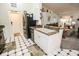 Kitchen with granite countertops, stainless steel appliances, and tiled floor at 905 Oxford Park Dr, Sun City Center, FL 33573