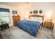 Spacious main bedroom with king-size bed and ample storage at 905 Oxford Park Dr # A, Sun City Center, FL 33573