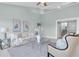 Spacious living area featuring a light and airy color palette at 1580 Mac Chesney Dr, Tarpon Springs, FL 34689