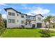 Modern home with a two-car garage and lush landscaping at 1954 Iowa Ne Ave, St Petersburg, FL 33703