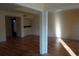 Living room features hardwood floors and white cabinets at 4108 Pinelake Ln # 102, Tampa, FL 33618