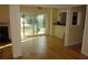 Open-concept living room with hardwood floors and water views at 4108 Pinelake Ln # 102, Tampa, FL 33618