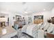 Serene bedroom featuring wood floors and a view of the pool at 910 Oakwood Dr, Largo, FL 33770