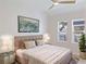 Bright bedroom with a comfortable bed and plenty of natural light at 3811 N Arlington Ave, Tampa, FL 33603