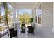 Inviting front porch with seating area, ideal for relaxing outdoors at 3811 N Arlington Ave, Tampa, FL 33603